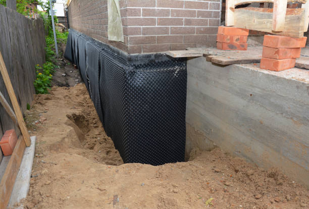 SJ Waterproofing Pros technician performing targeted Exterior Waterproofing assessment in Chester, NJ